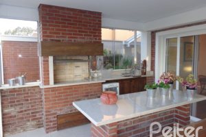 Casa em Condomínio à venda com 392m², 3 dormitórios, 1 suíte, 2 vagas, no bairro Terra Ville em Porto Alegre