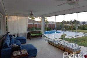 Casa em Condomínio à venda com 392m², 3 dormitórios, 1 suíte, 2 vagas, no bairro Terra Ville em Porto Alegre