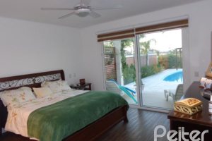 Casa em Condomínio à venda com 392m², 3 dormitórios, 1 suíte, 2 vagas, no bairro Terra Ville em Porto Alegre