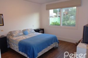 Casa em Condomínio à venda com 392m², 3 dormitórios, 1 suíte, 2 vagas, no bairro Terra Ville em Porto Alegre