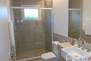 Casa em Condomínio à venda com 392m², 3 dormitórios, 1 suíte, 2 vagas, no bairro Terra Ville em Porto Alegre