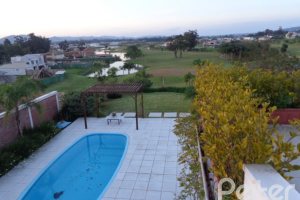 Casa em Condomínio à venda com 392m², 3 dormitórios, 1 suíte, 2 vagas, no bairro Terra Ville em Porto Alegre