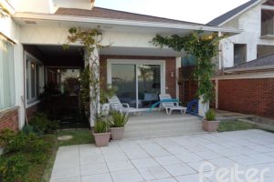 Casa em Condomínio à venda com 392m², 3 dormitórios, 1 suíte, 2 vagas, no bairro Terra Ville em Porto Alegre