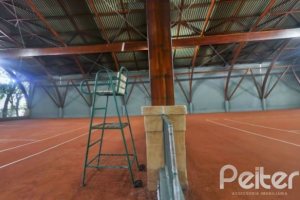 Casa em Condomínio à venda com 392m², 3 dormitórios, 1 suíte, 2 vagas, no bairro Terra Ville em Porto Alegre