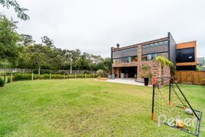 Casa em Condomínio à venda com 560m², 5 dormitórios, 5 suítes, 4 vagas, no bairro Terra Ville em PORTO ALEGRE