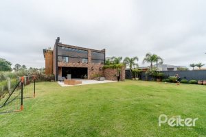 Casa em Condomínio à venda com 560m², 5 dormitórios, 5 suítes, 4 vagas, no bairro Terra Ville em PORTO ALEGRE