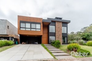 Casa em Condomínio à venda com 560m², 5 dormitórios, 5 suítes, 4 vagas, no bairro Terra Ville em PORTO ALEGRE