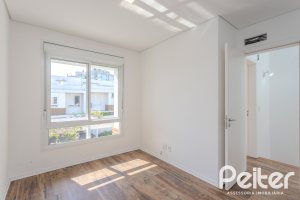 Casa em Condomínio à venda com 169m², 3 dormitórios, 1 suíte, 2 vagas, no bairro Tristeza em PORTO ALEGRE