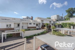 Casa em Condomínio à venda com 169m², 3 dormitórios, 1 suíte, 2 vagas, no bairro Tristeza em PORTO ALEGRE