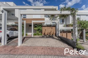 Casa em Condomínio à venda com 169m², 3 dormitórios, 1 suíte, 2 vagas, no bairro Tristeza em PORTO ALEGRE