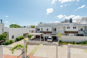 Casa em Condomínio à venda com 169m², 3 dormitórios, 1 suíte, 2 vagas, no bairro Tristeza em PORTO ALEGRE