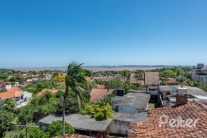 Casa à venda com 436m², 4 dormitórios, 4 suítes, 5 vagas, no bairro Vila Assunção em Porto Alegre