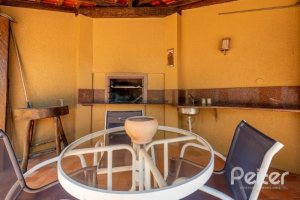 Casa à venda com 436m², 4 dormitórios, 4 suítes, 5 vagas, no bairro Vila Assunção em Porto Alegre