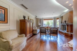 Casa à venda com 436m², 4 dormitórios, 4 suítes, 5 vagas, no bairro Vila Assunção em Porto Alegre