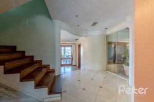 Casa à venda com 436m², 4 dormitórios, 4 suítes, 5 vagas, no bairro Vila Assunção em Porto Alegre