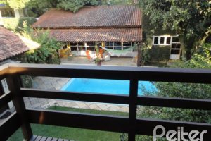 Casa à venda com 500m², 4 dormitórios, 3 suítes, 4 vagas, no bairro Tristeza em Porto Alegre