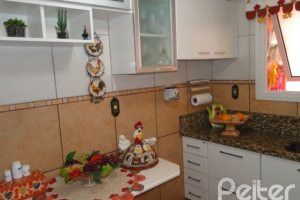 Casa em Condomínio à venda com 131m², 4 dormitórios, 2 suítes, 2 vagas, no bairro Tristeza em Porto Alegre
