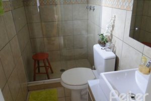 Casa em Condomínio à venda com 131m², 4 dormitórios, 2 suítes, 2 vagas, no bairro Tristeza em Porto Alegre