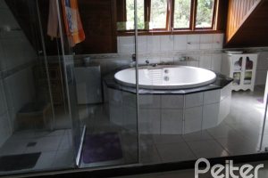 Casa em Condomínio à venda com 131m², 4 dormitórios, 2 suítes, 2 vagas, no bairro Tristeza em Porto Alegre
