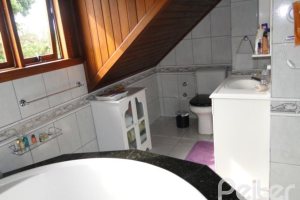 Casa em Condomínio à venda com 131m², 4 dormitórios, 2 suítes, 2 vagas, no bairro Tristeza em Porto Alegre