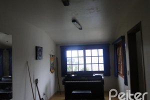 Casa em Condomínio à venda com 236m², 4 dormitórios, 1 suíte, 3 vagas, no bairro Espírito Santo em Porto Alegre