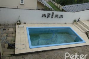 Casa em Condomínio à venda com 236m², 4 dormitórios, 1 suíte, 3 vagas, no bairro Espírito Santo em Porto Alegre