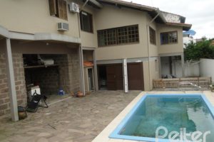 Casa em Condomínio à venda com 236m², 4 dormitórios, 1 suíte, 3 vagas, no bairro Espírito Santo em Porto Alegre