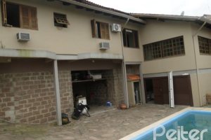 Casa em Condomínio à venda com 236m², 4 dormitórios, 1 suíte, 3 vagas, no bairro Espírito Santo em Porto Alegre