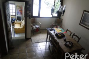 Casa em Condomínio à venda com 236m², 4 dormitórios, 1 suíte, 3 vagas, no bairro Espírito Santo em Porto Alegre