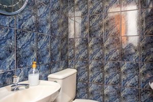 Casa à venda com 179m², 5 dormitórios, 3 vagas, no bairro Ipanema em Porto Alegre