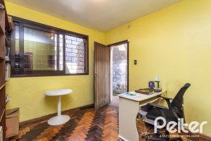 Casa à venda com 179m², 5 dormitórios, 3 vagas, no bairro Ipanema em Porto Alegre