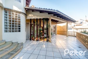 Casa à venda com 552m², 4 dormitórios, 2 suítes, 2 vagas, no bairro Jardim Isabel em Porto Alegre