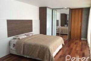 Casa em Condomínio à venda com 258m², 2 dormitórios, 2 suítes, 3 vagas, no bairro Hípica em Porto Alegre