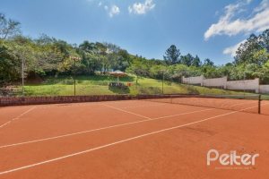 Casa em Condomínio à venda com 234m², 3 dormitórios, 3 suítes, 3 vagas, no bairro Hípica em Porto Alegre