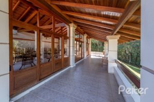 Casa em Condomínio à venda com 234m², 3 dormitórios, 3 suítes, 3 vagas, no bairro Hípica em Porto Alegre