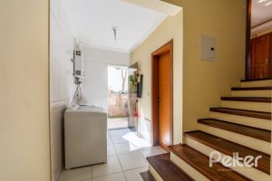 Casa em Condomínio à venda com 234m², 3 dormitórios, 3 suítes, 3 vagas, no bairro Hípica em Porto Alegre