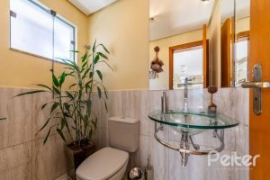 Casa em Condomínio à venda com 234m², 3 dormitórios, 3 suítes, 3 vagas, no bairro Hípica em Porto Alegre