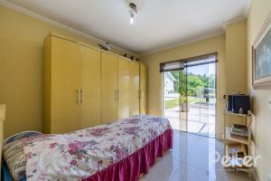 Casa em Condomínio à venda com 234m², 3 dormitórios, 3 suítes, 3 vagas, no bairro Hípica em Porto Alegre