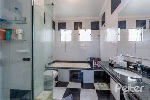 Casa em Condomínio à venda com 234m², 3 dormitórios, 3 suítes, 3 vagas, no bairro Hípica em Porto Alegre
