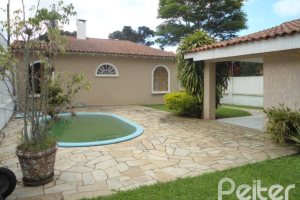 Casa à venda com 259m², 3 dormitórios, 1 suíte, 2 vagas, no bairro Jardim Isabel em Porto Alegre