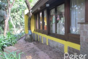 Casa à venda com 600m², 7 dormitórios, 3 suítes, 3 vagas, no bairro Espírito Santo em Porto Alegre