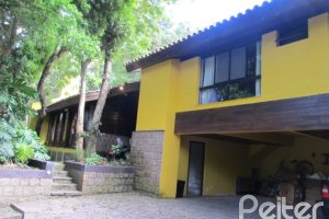 Casa à venda com 600m², 7 dormitórios, 3 suítes, 3 vagas, no bairro Espírito Santo em Porto Alegre