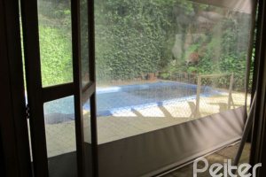 Casa à venda com 600m², 7 dormitórios, 3 suítes, 3 vagas, no bairro Espírito Santo em Porto Alegre