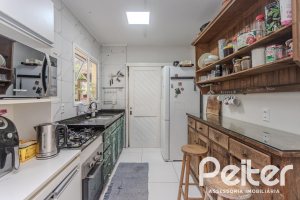 Casa em Condomínio à venda com 131m², 3 dormitórios, 2 suítes, 2 vagas, no bairro Tristeza em Porto Alegre