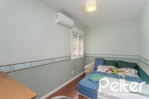 Casa em Condomínio à venda com 131m², 3 dormitórios, 2 suítes, 2 vagas, no bairro Tristeza em Porto Alegre