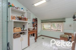 Casa em Condomínio à venda com 131m², 3 dormitórios, 2 suítes, 2 vagas, no bairro Tristeza em Porto Alegre