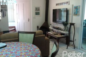 Casa em Condomínio à venda com 131m², 2 dormitórios, 1 suíte, 2 vagas, no bairro Tristeza em Porto Alegre