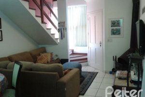 Casa em Condomínio à venda com 131m², 2 dormitórios, 1 suíte, 2 vagas, no bairro Tristeza em Porto Alegre