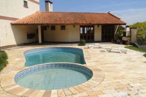 Casa em Condomínio à venda com 139m², 3 dormitórios, 1 suíte, 3 vagas, no bairro Tristeza em PORTO ALEGRE