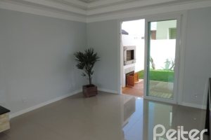 Casa em Condomínio à venda com 164m², 3 dormitórios, 1 suíte, 2 vagas, no bairro Hípica em PORTO ALEGRE